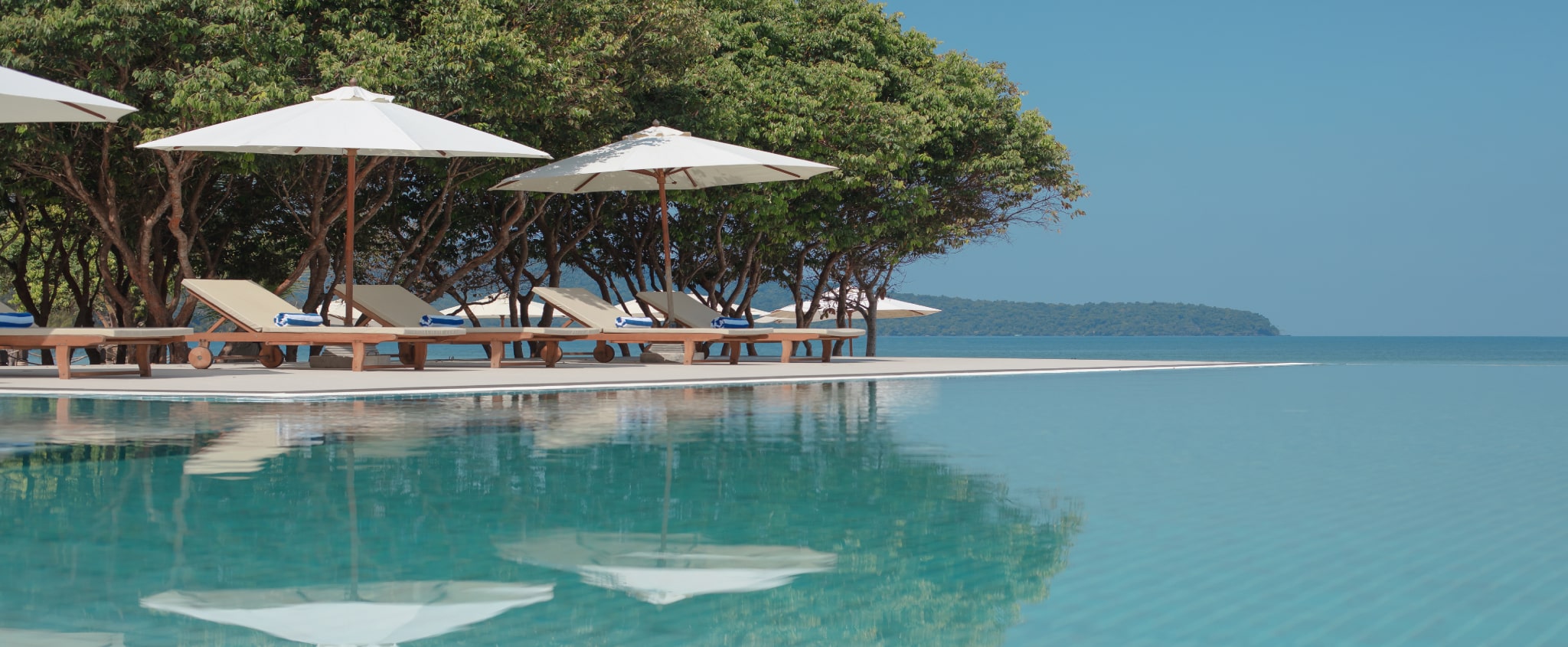 Family on a beach at a Marriott Residence