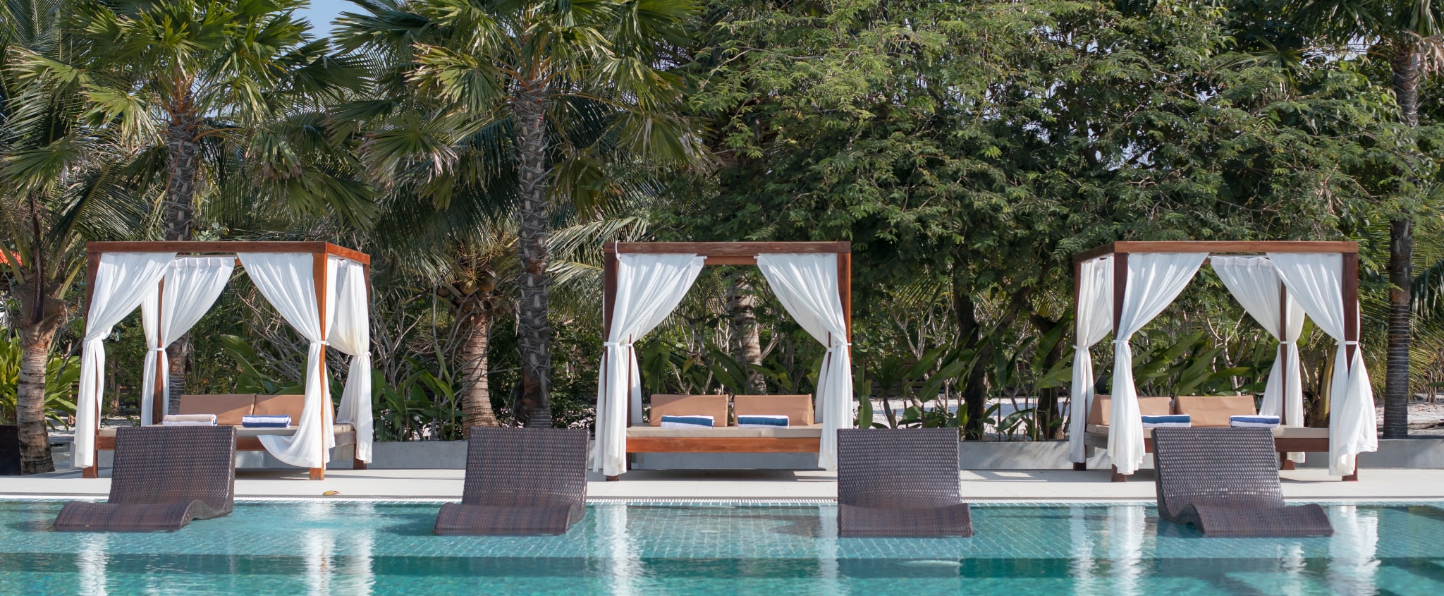 Family on a beach at a Marriott Residence