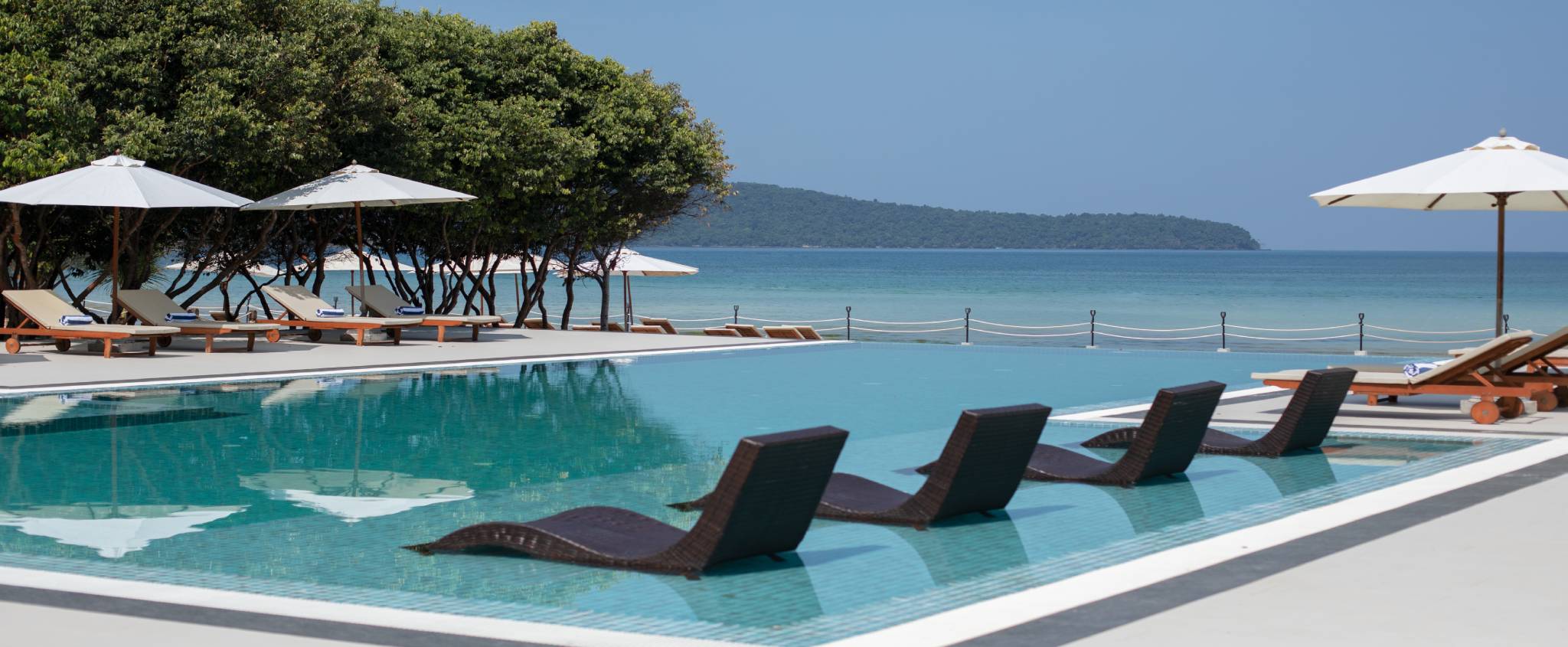 Family on a beach at a Marriott Residence